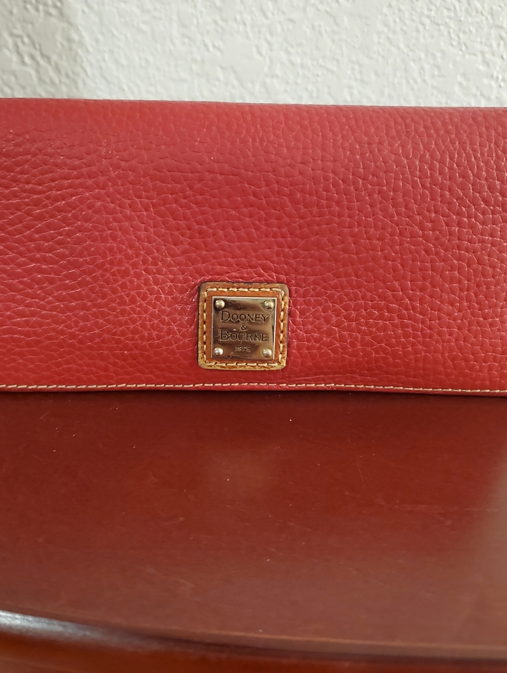 Dooney & Bourke Red Pebbled Leather Continental Wallet with Gold Plaque